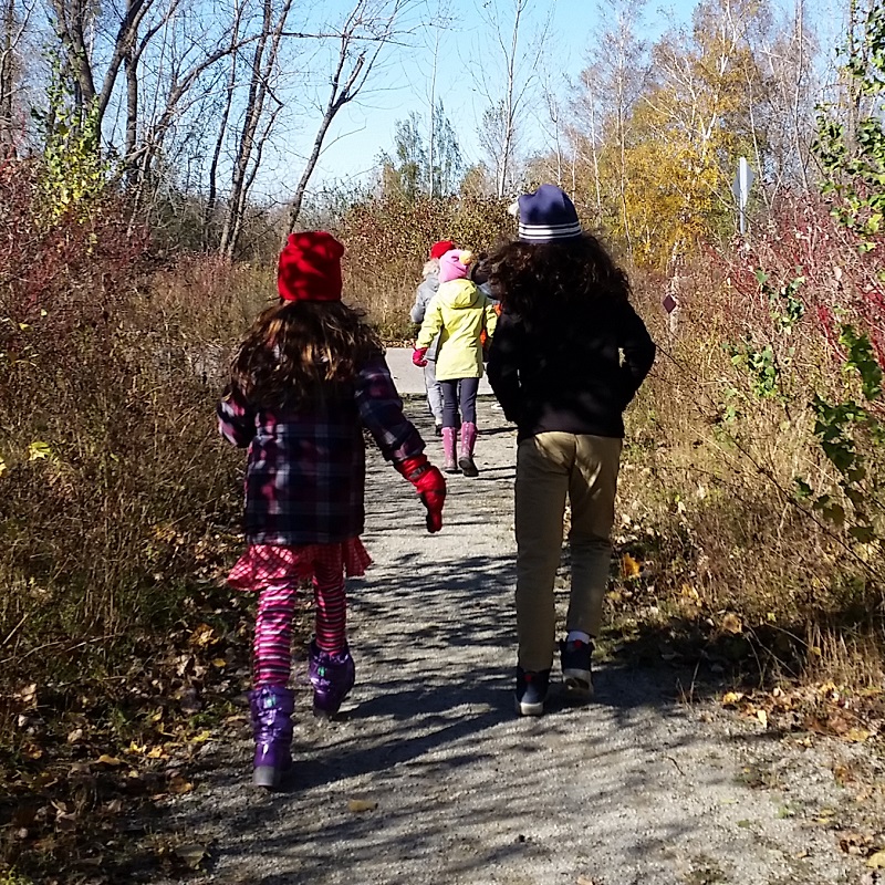 students explore trails during a PA day camp at Tommy Thompson Park